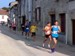 Les premiers coureurs du 5 km au 1er tour rue du Canal